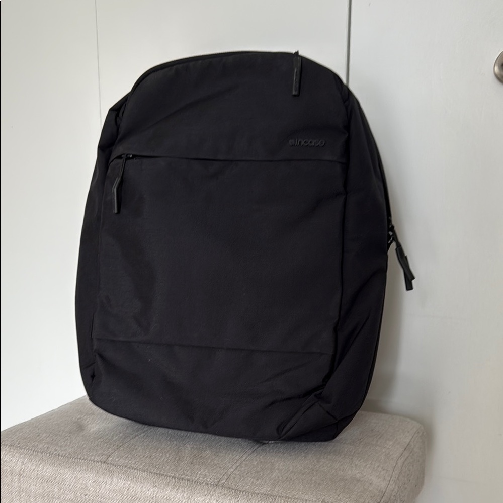 Incase Black Backpack with Durable Fabric and Water-Resistant Finish